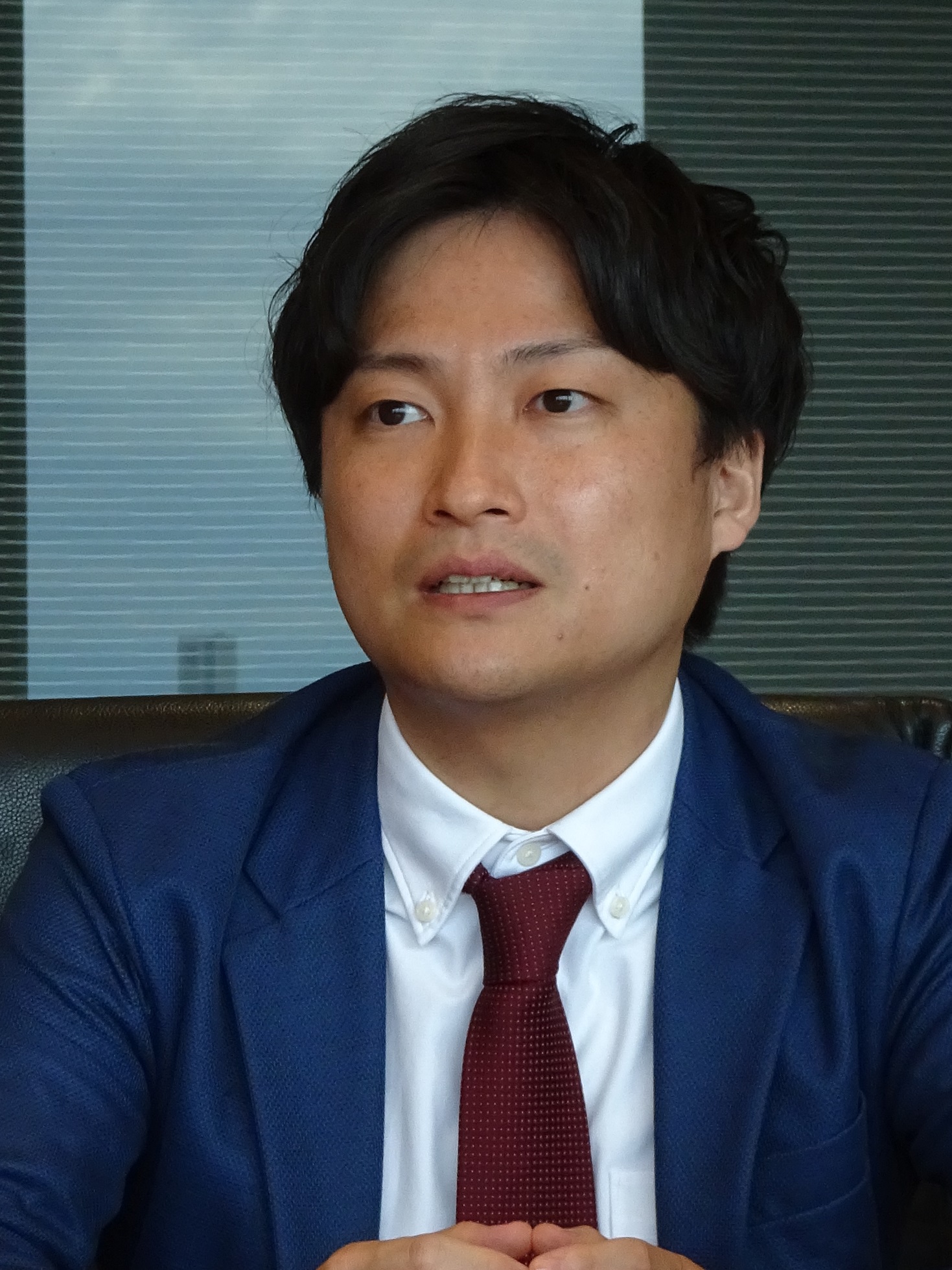 GL策定の背景を説明する横田弁護士