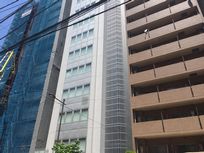 ケフィア事業振興会の本社ビル（真ん中の白い建物）